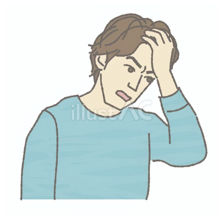 頭を抱える男性